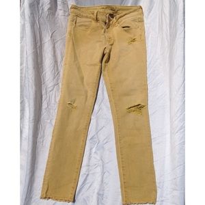 American Eagle distressed yellow jeggings